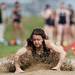 A Saline High School track player competes in the high jump on Tuesday, April 30. Daniel Brenner I AnnArbor.com